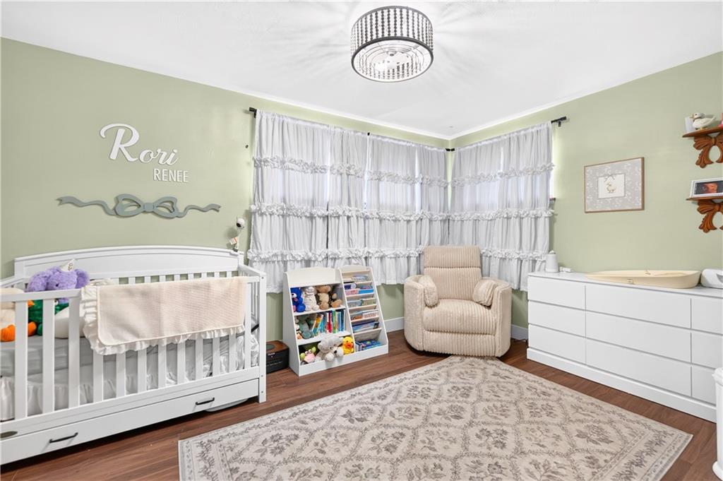 1642 Rostraver Road Belle Vernon, PA 15012 - Photo 17 of 32 a bedroom with furniture and a window