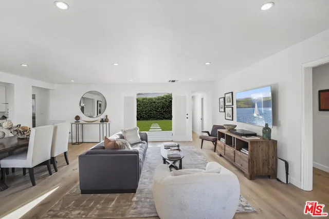 a kitchen with a stove and a refrigerator