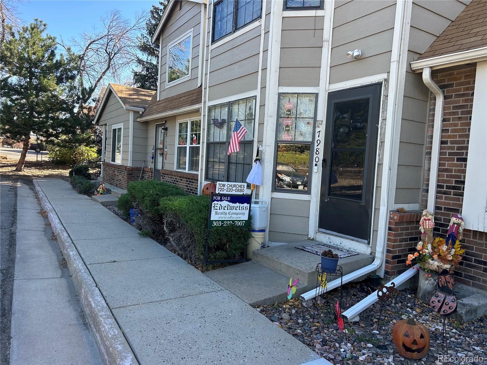 7980 Chase Circle, Unit F Arvada, CO 80003 - Photo 15 of 16 front view of a house
