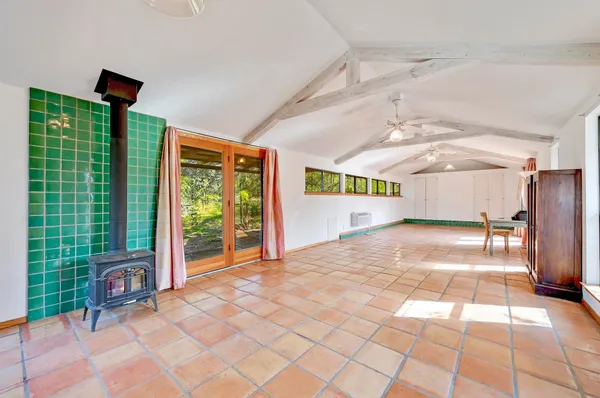 a view of an empty room with a balcony