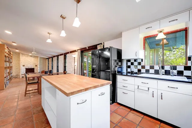 a balcony with wooden floor