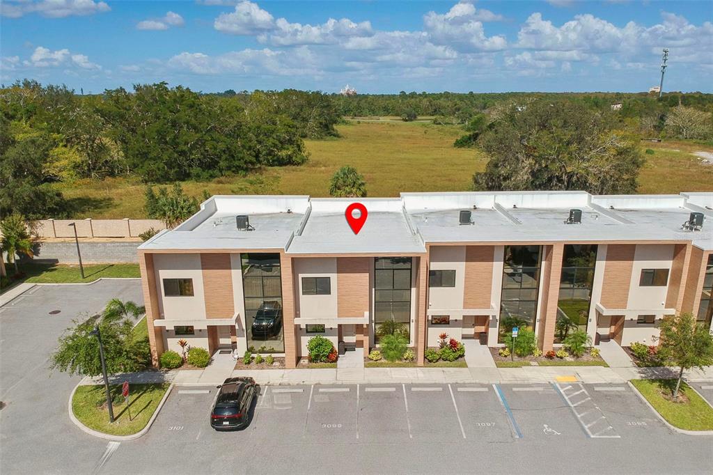 3099 Rockefeller Way Kissimmee, FL 34747 - Photo 2 of 54 a view of a patio with swimming pool and a chairs
