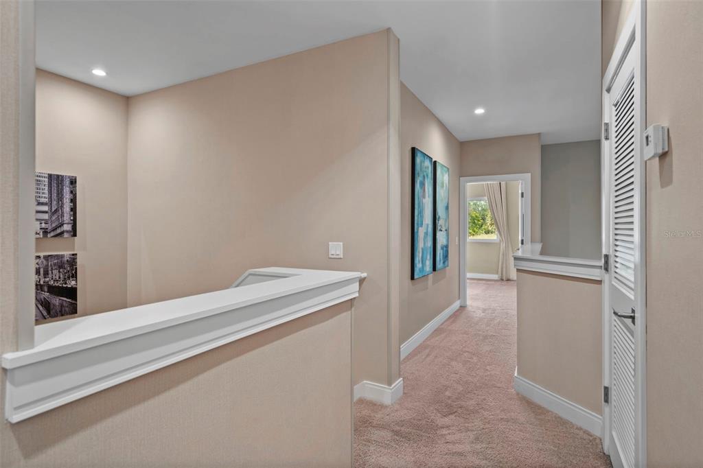 3099 Rockefeller Way Kissimmee, FL 34747 - Photo 25 of 54 a view of hallway with stairs