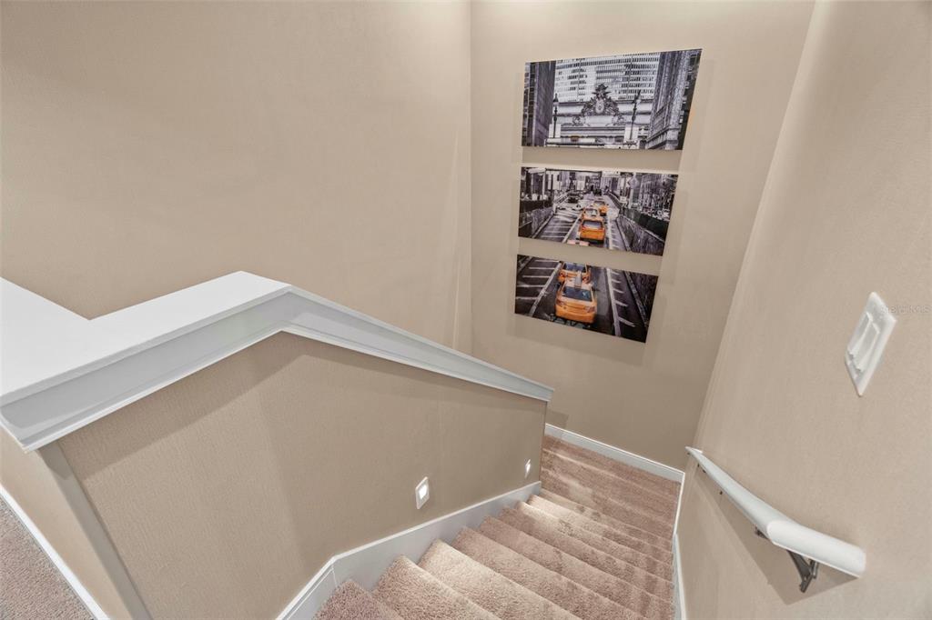 3099 Rockefeller Way Kissimmee, FL 34747 - Photo 32 of 54 a view of a hallway with stairs