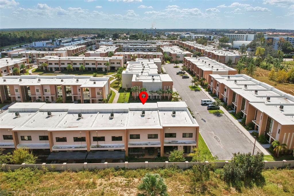 3099 Rockefeller Way Kissimmee, FL 34747 - Photo 35 of 54 a view of a city and tall buildings