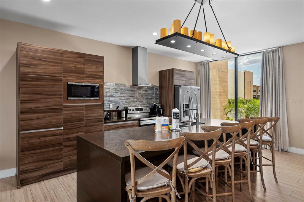 3099 Rockefeller Way Kissimmee, FL 34747 - Photo 5 of 54 a view of a dining room with furniture window and outside view