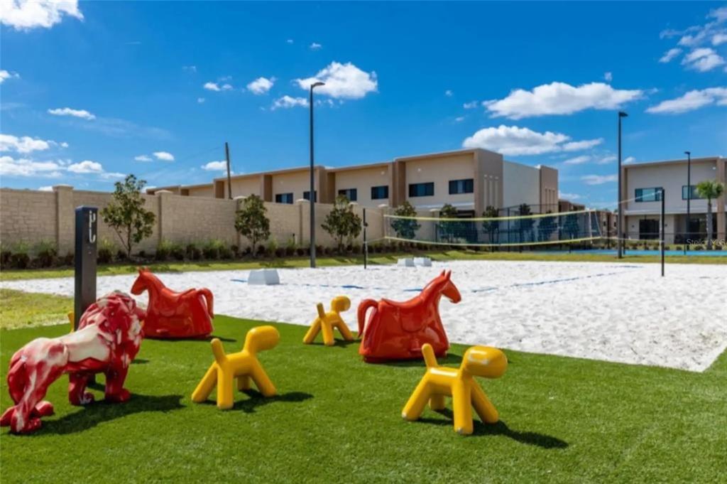 3099 Rockefeller Way Kissimmee, FL 34747 - Photo 51 of 54 a garden view with a seating space