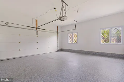 a bathroom with a bathtub and a sink