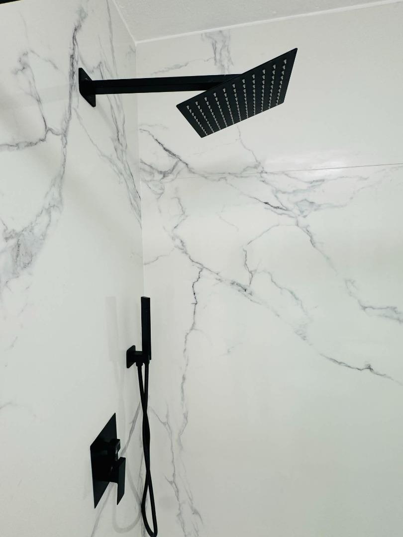 1213 Lightland Road San Jose, CA 95121 - Photo 12 of 16 a close view of shower tap