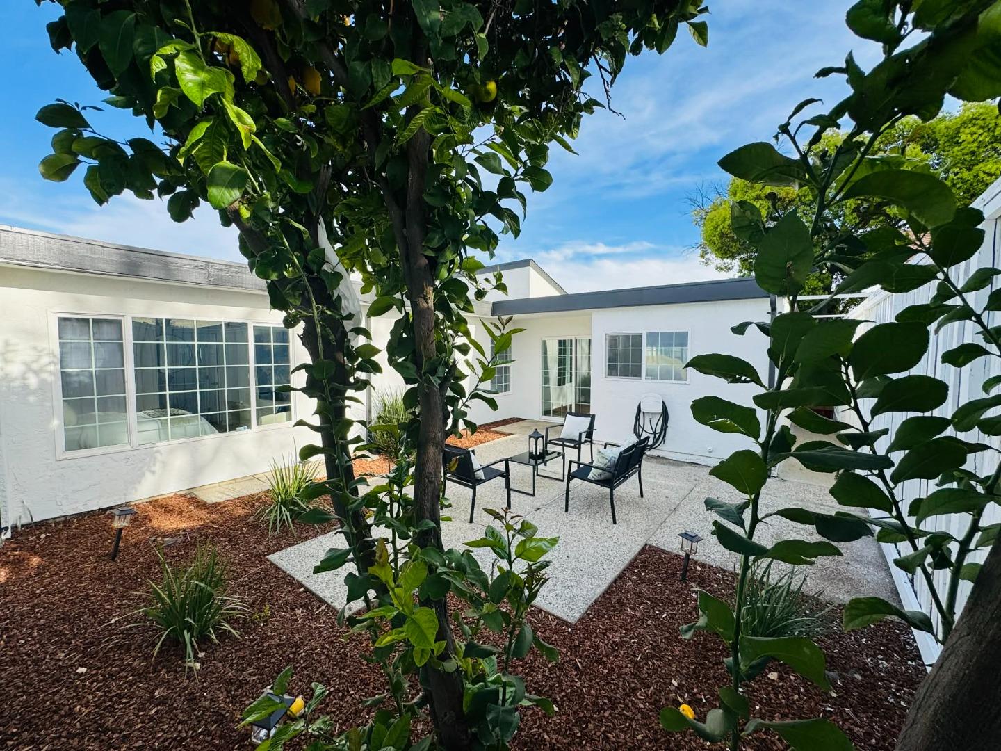 1213 Lightland Road San Jose, CA 95121 - Photo 16 of 16 a house with lots of trees