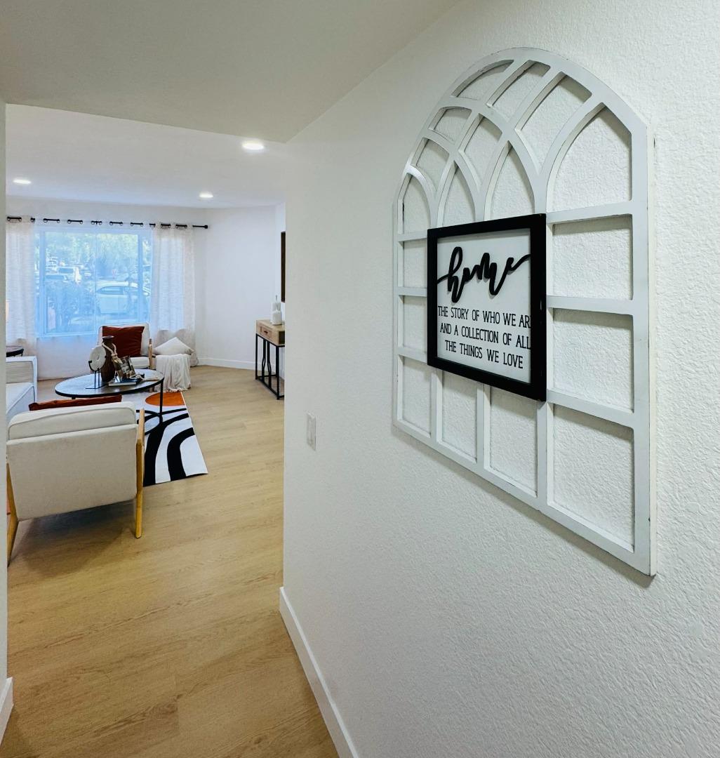 1213 Lightland Road San Jose, CA 95121 - Photo 6 of 16 a view of a hallway with workspace