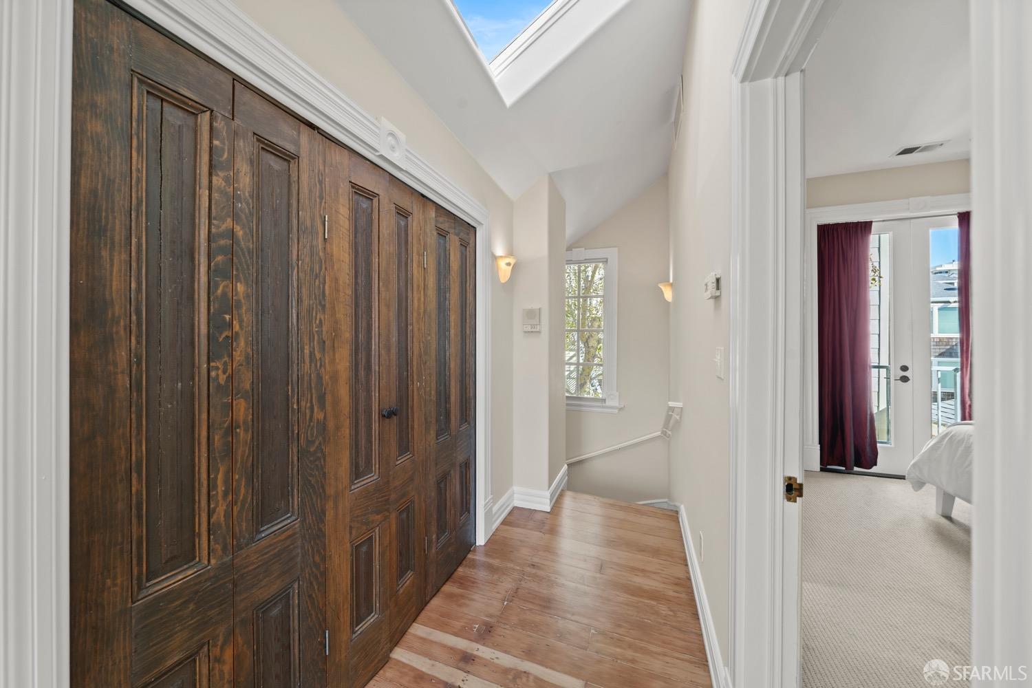 1 Cottage Row San Francisco, CA 94115 - Photo 18 of 52 a view of a hallway with wooden floor and entryway