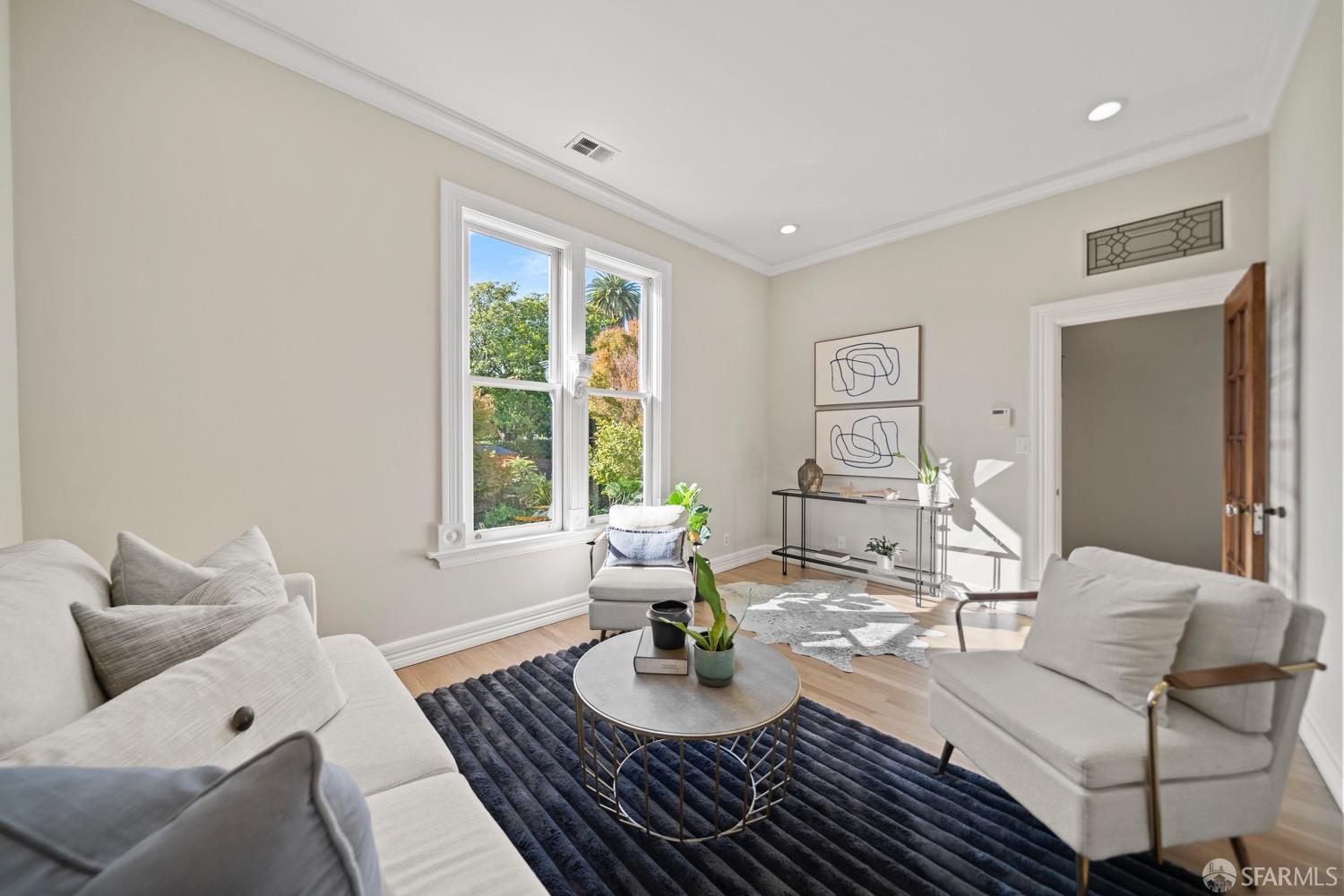 1 Cottage Row San Francisco, CA 94115 - Photo 20 of 52 a living room with furniture and a window