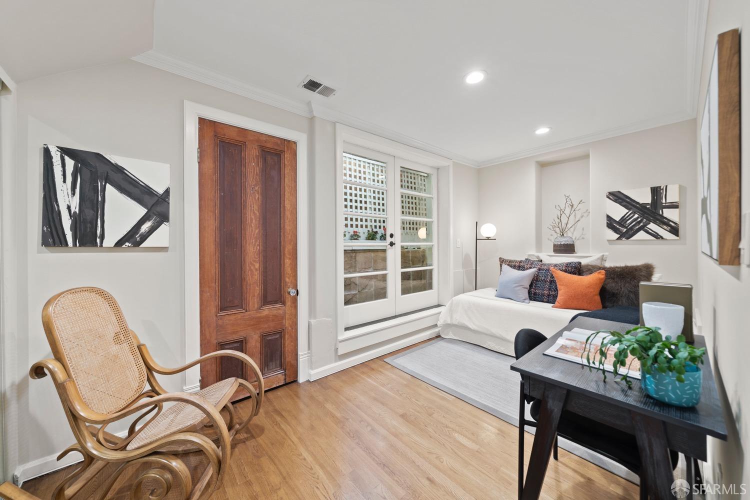 1 Cottage Row San Francisco, CA 94115 - Photo 28 of 52 a living room with furniture and a large window