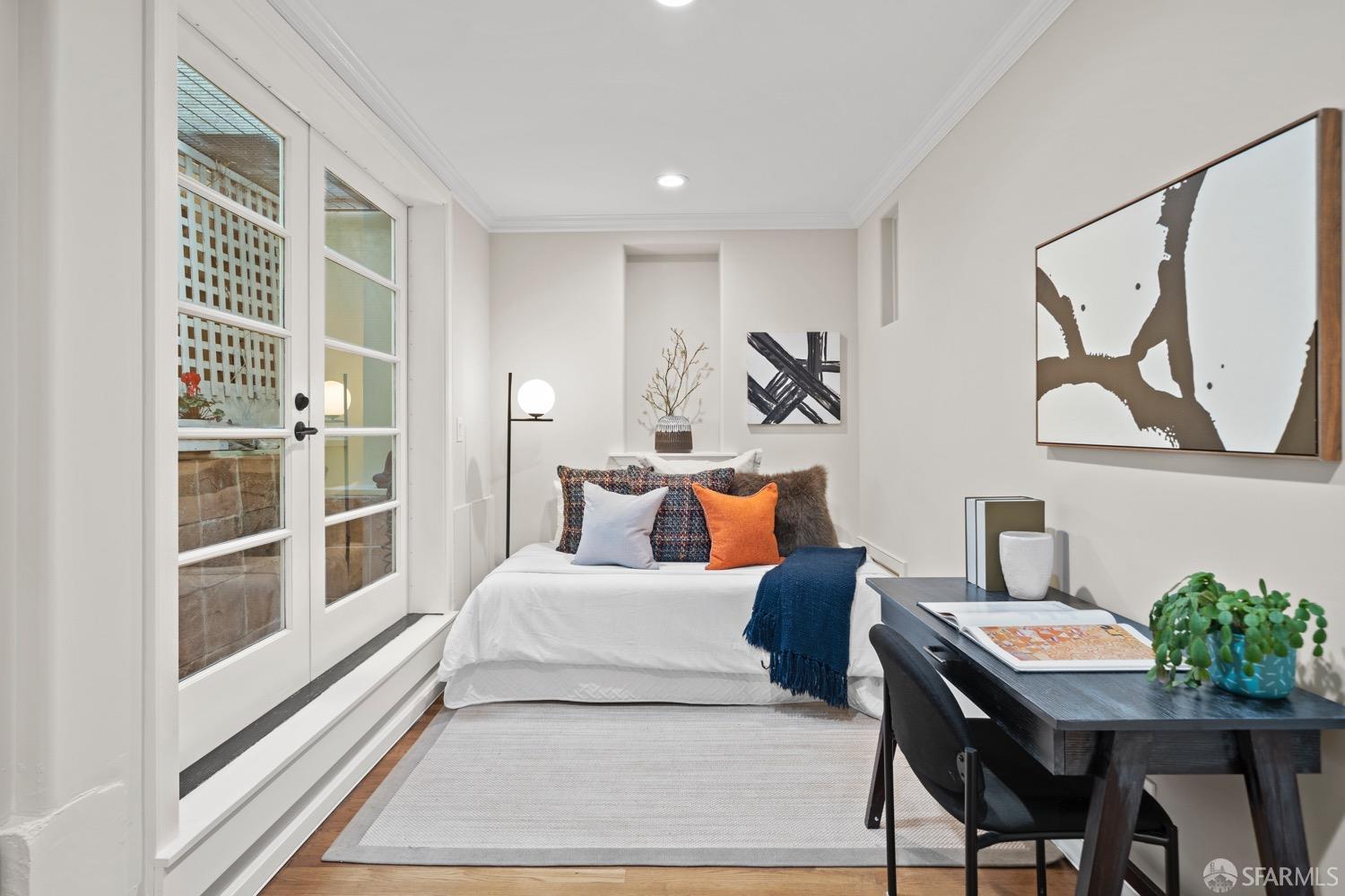 1 Cottage Row San Francisco, CA 94115 - Photo 29 of 52 a living room with furniture and a painting on the wall