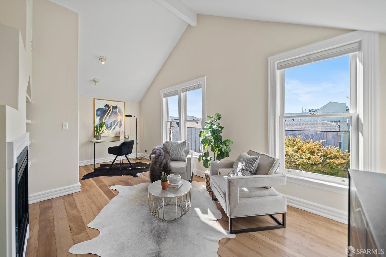 1 Cottage Row San Francisco, CA 94115 - Photo 4 of 52 a living room with furniture and a potted plant