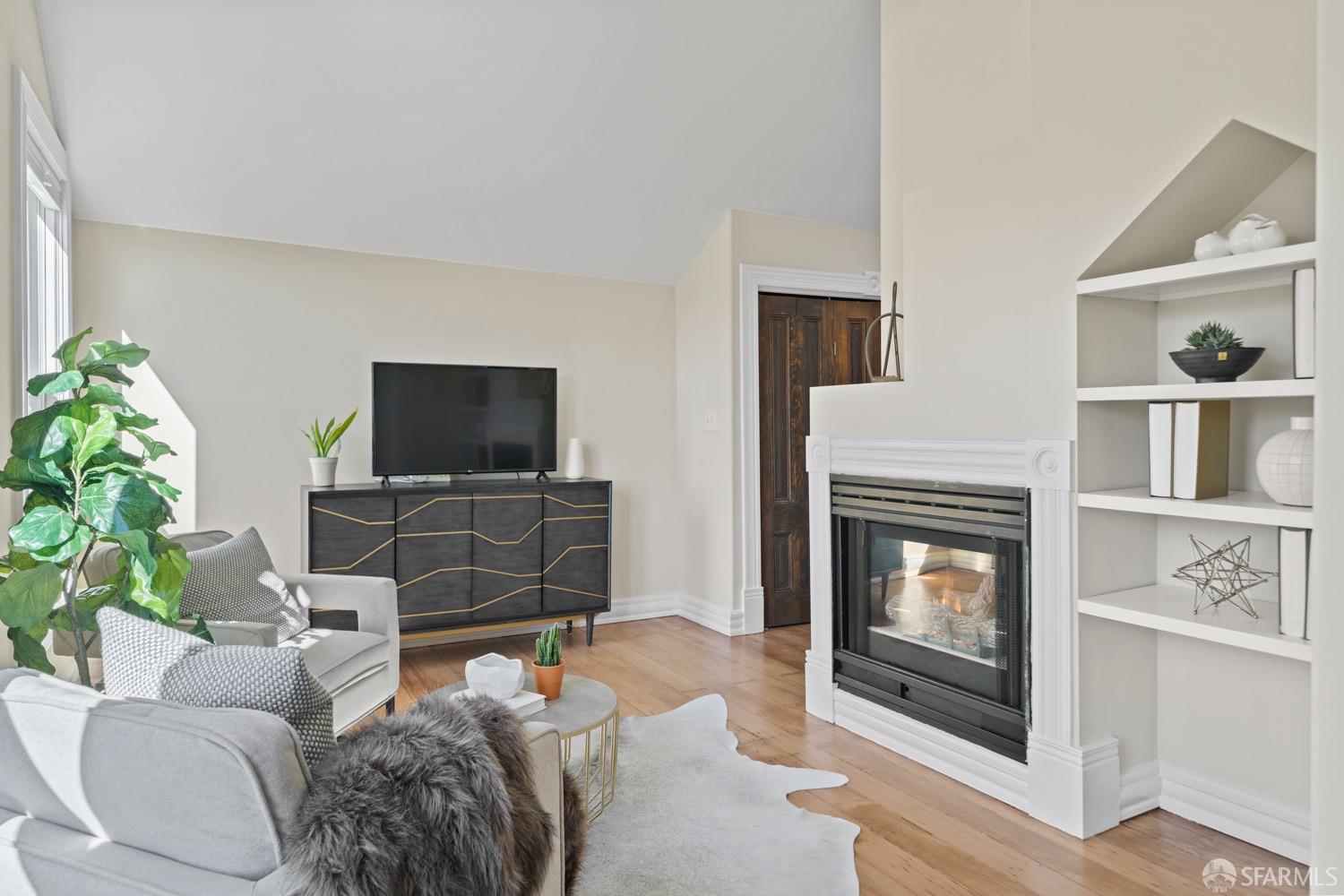 1 Cottage Row San Francisco, CA 94115 - Photo 5 of 52 a living room with furniture and a fireplace