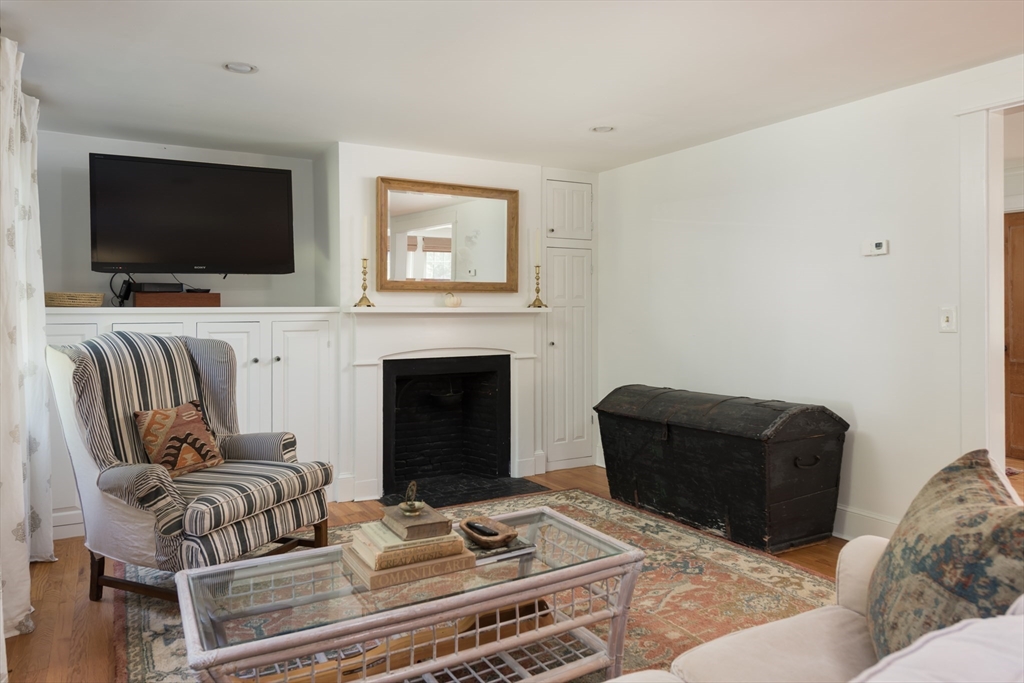 86 Fairhaven Road Mattapoisett, MA 02739 - Photo 17 of 40 a living room with furniture and a flat screen tv