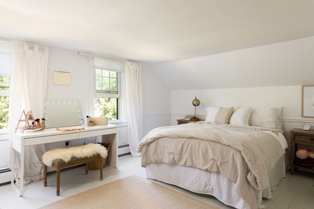 86 Fairhaven Road Mattapoisett, MA 02739 - Photo 21 of 40 a bedroom with a bed and a couch