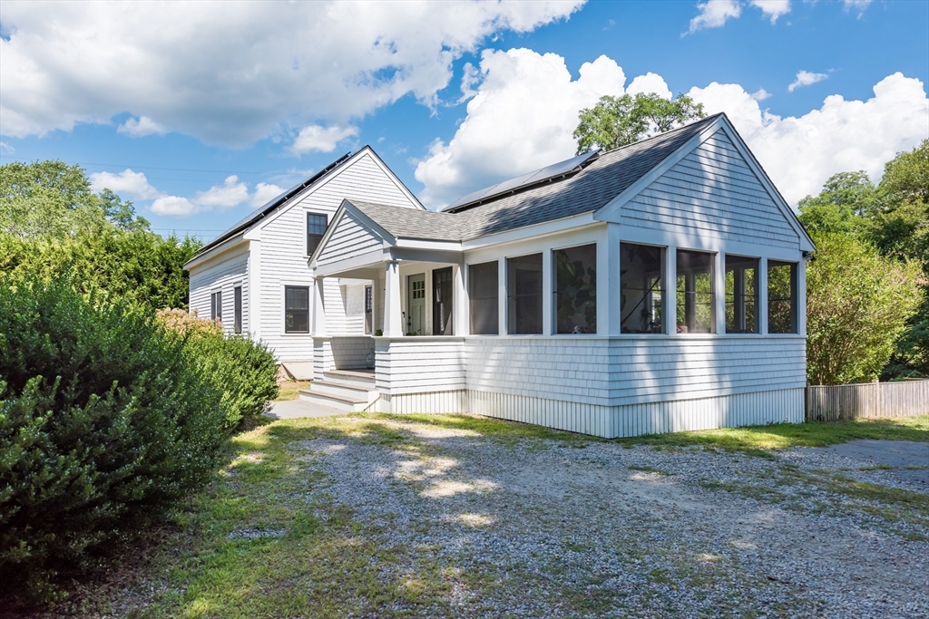 86 Fairhaven Road Mattapoisett, MA 02739 - Photo 26 of 40 a view of a house with a yard
