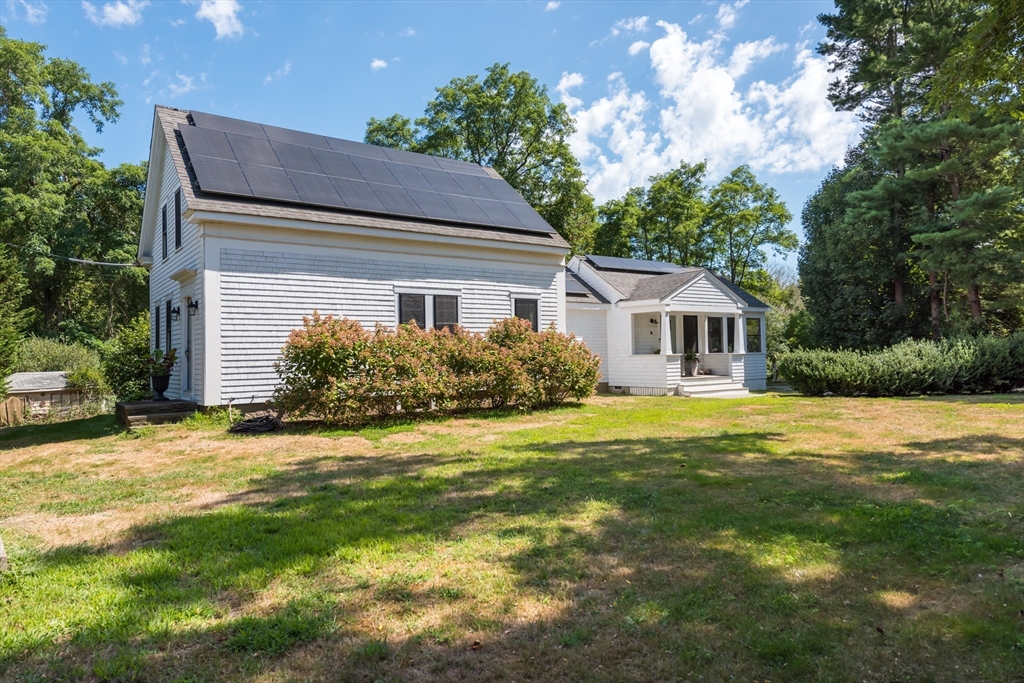 86 Fairhaven Road Mattapoisett, MA 02739 - Photo 28 of 40 a house view with a garden space