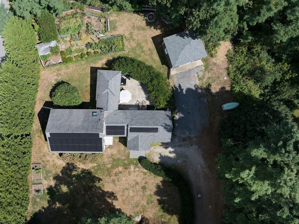 86 Fairhaven Road Mattapoisett, MA 02739 - Photo 37 of 40 an aerial view of a house with a yard
