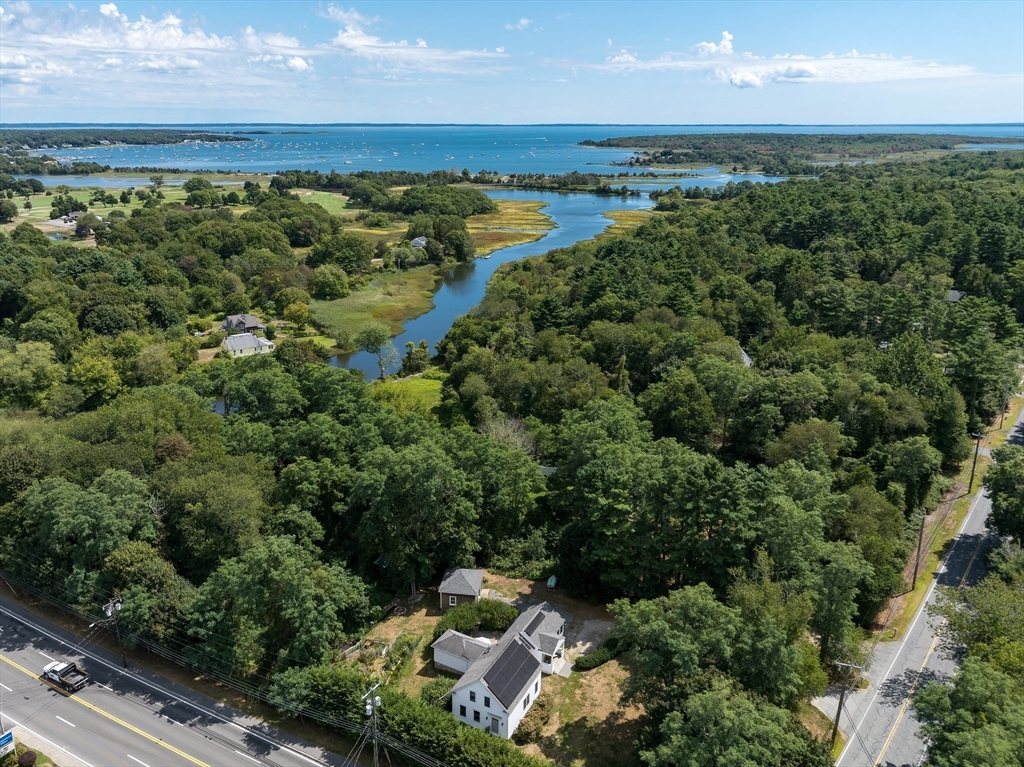 86 Fairhaven Road Mattapoisett, MA 02739 - Photo 38 of 40 an aerial view of residential houses with outdoor space and trees