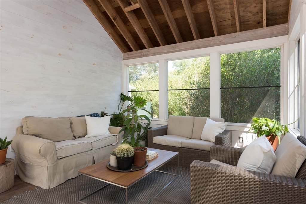 86 Fairhaven Road Mattapoisett, MA 02739 - Photo 7 of 40 a living room with furniture and a potted plant