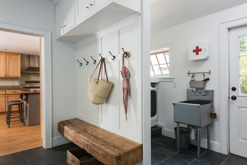 86 Fairhaven Road Mattapoisett, MA 02739 - Photo 9 of 40 a living room with furniture and a table