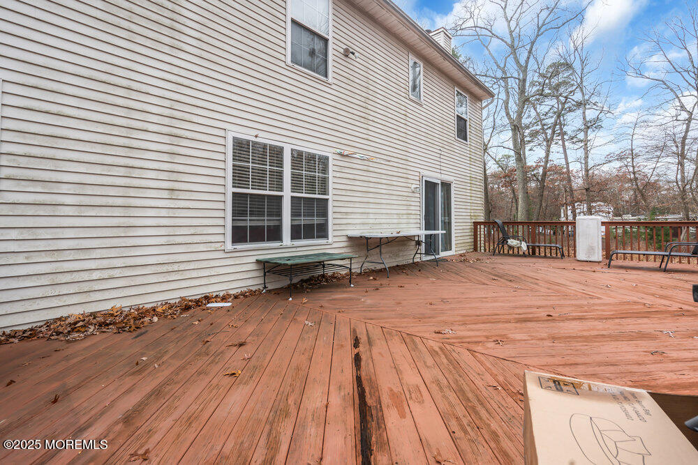 886 Green Valley Road Jackson, NJ 08527 - Photo 20 of 20 a view of a backyard with a large tree