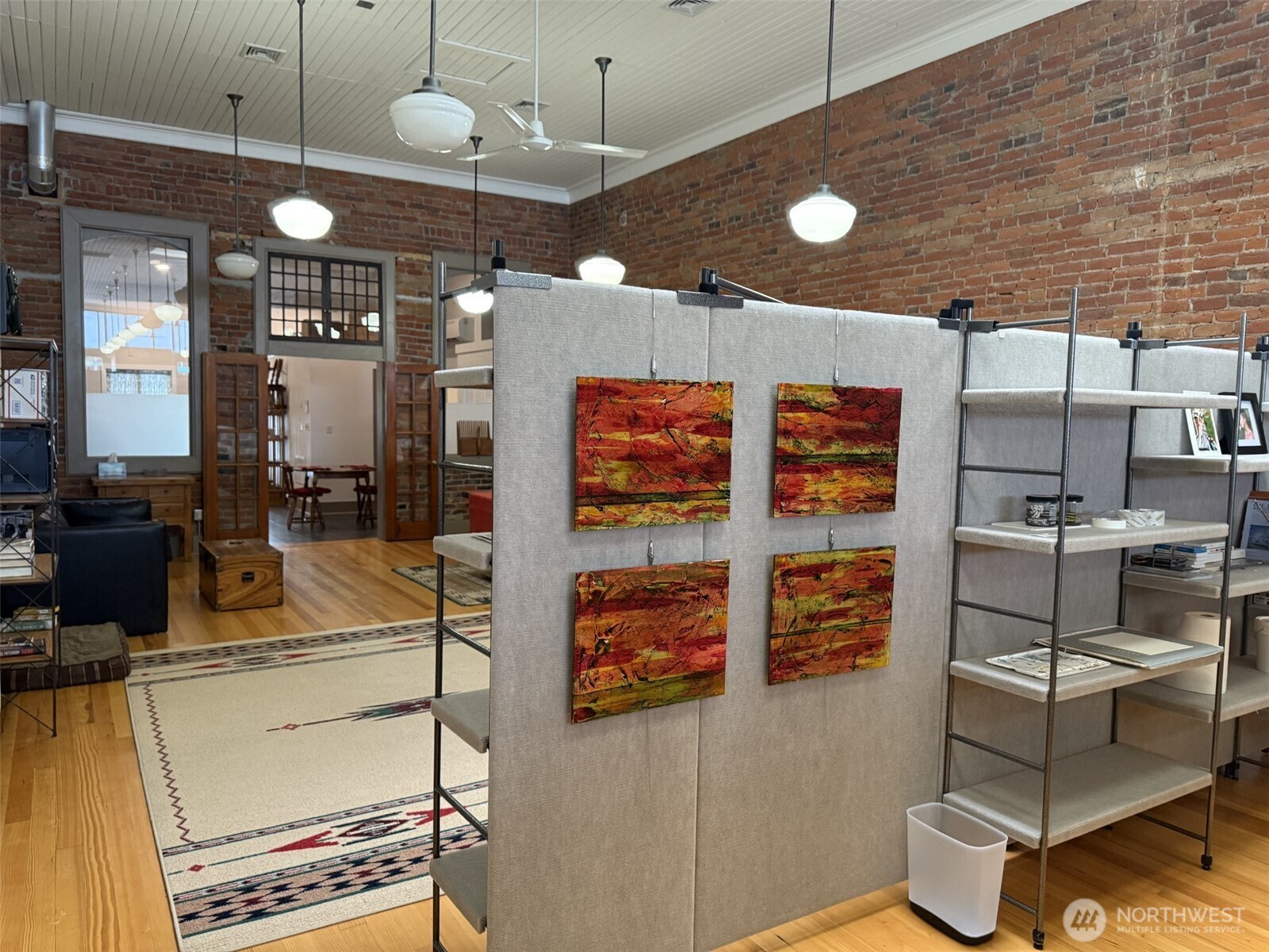 250 East Main Street Dayton, WA 99328 - Photo 11 of 33 a kitchen with stainless steel appliances kitchen island granite countertop a stove and cabinets