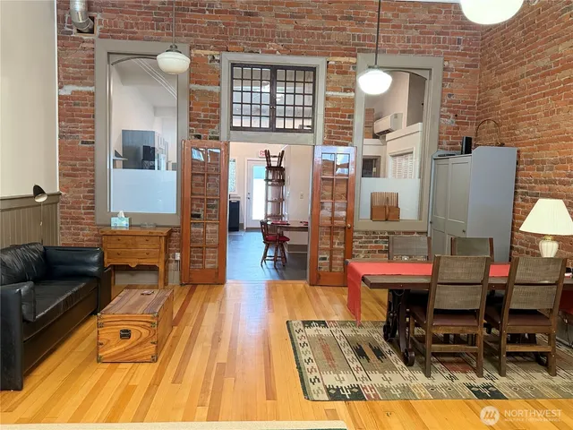 a front view of a house with outdoor seating