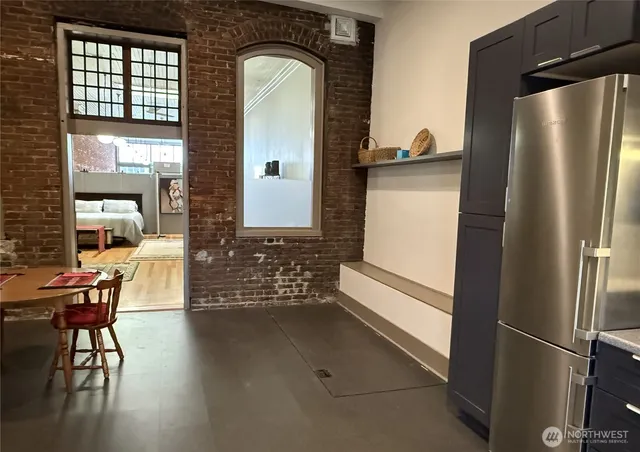 a kitchen with a sink stove and refrigerator