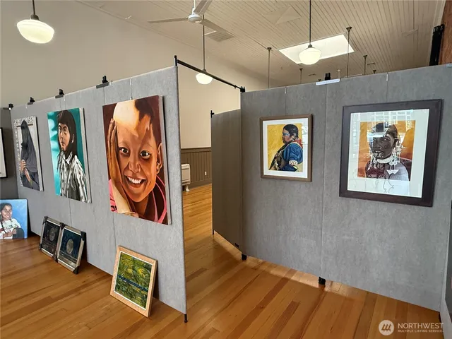 a view of an entryway with wooden floor