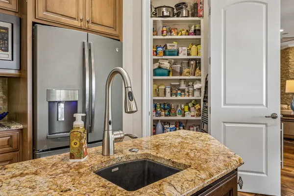 a view of a balcony with wooden floor