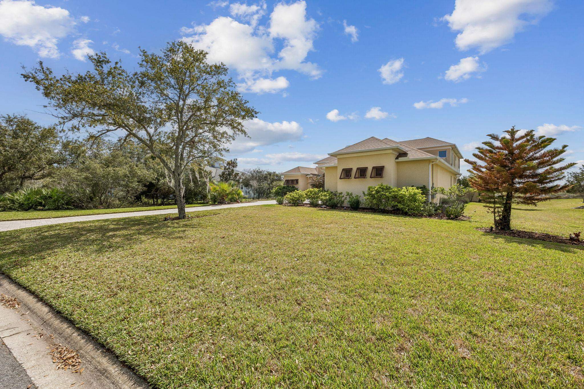 409 Lookout Point Drive St. Augustine, FL 32080 - Photo 4 of 90 a view of a house with a yard