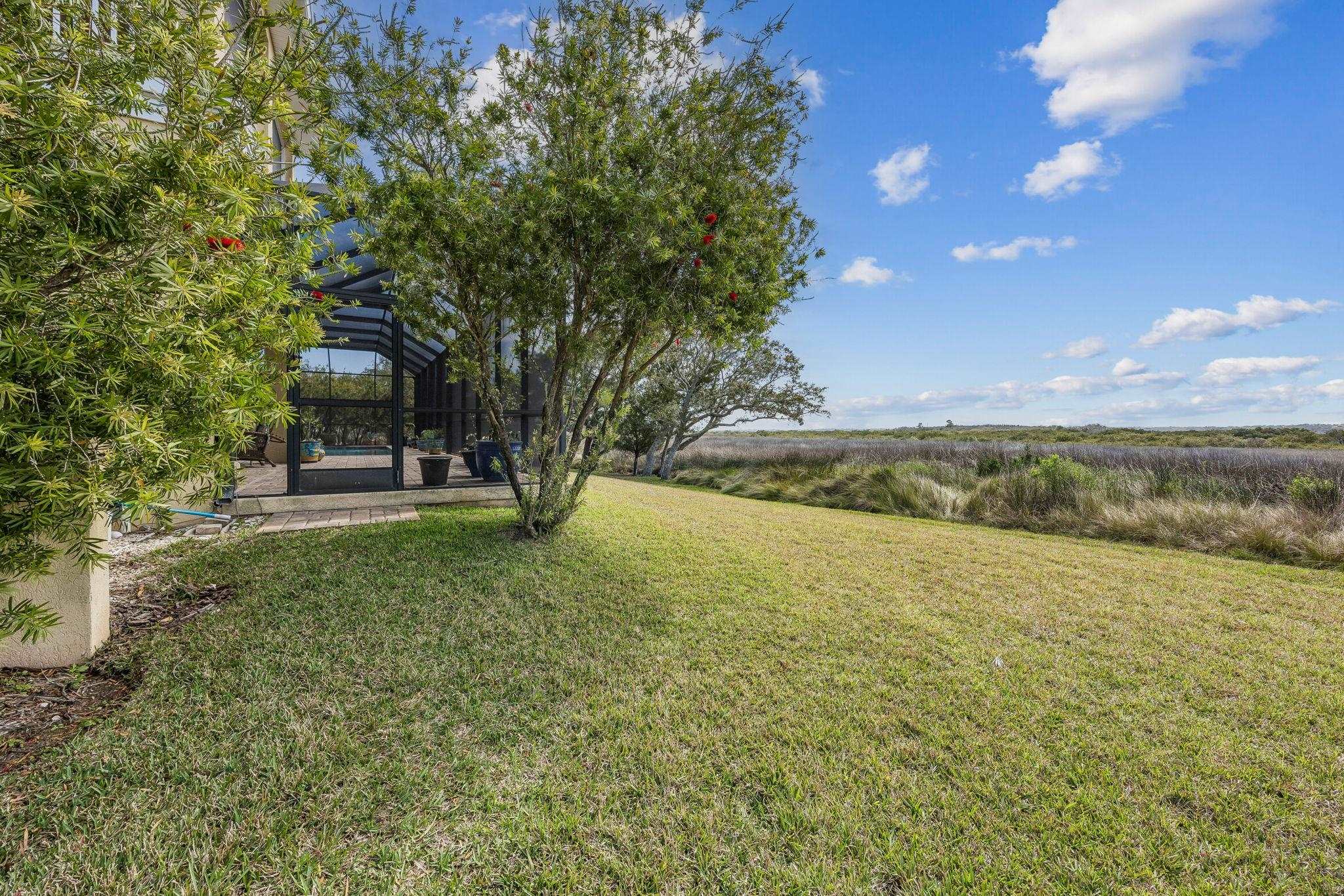 409 Lookout Point Drive St. Augustine, FL 32080 - Photo 42 of 90 a view of an outdoor space and yard