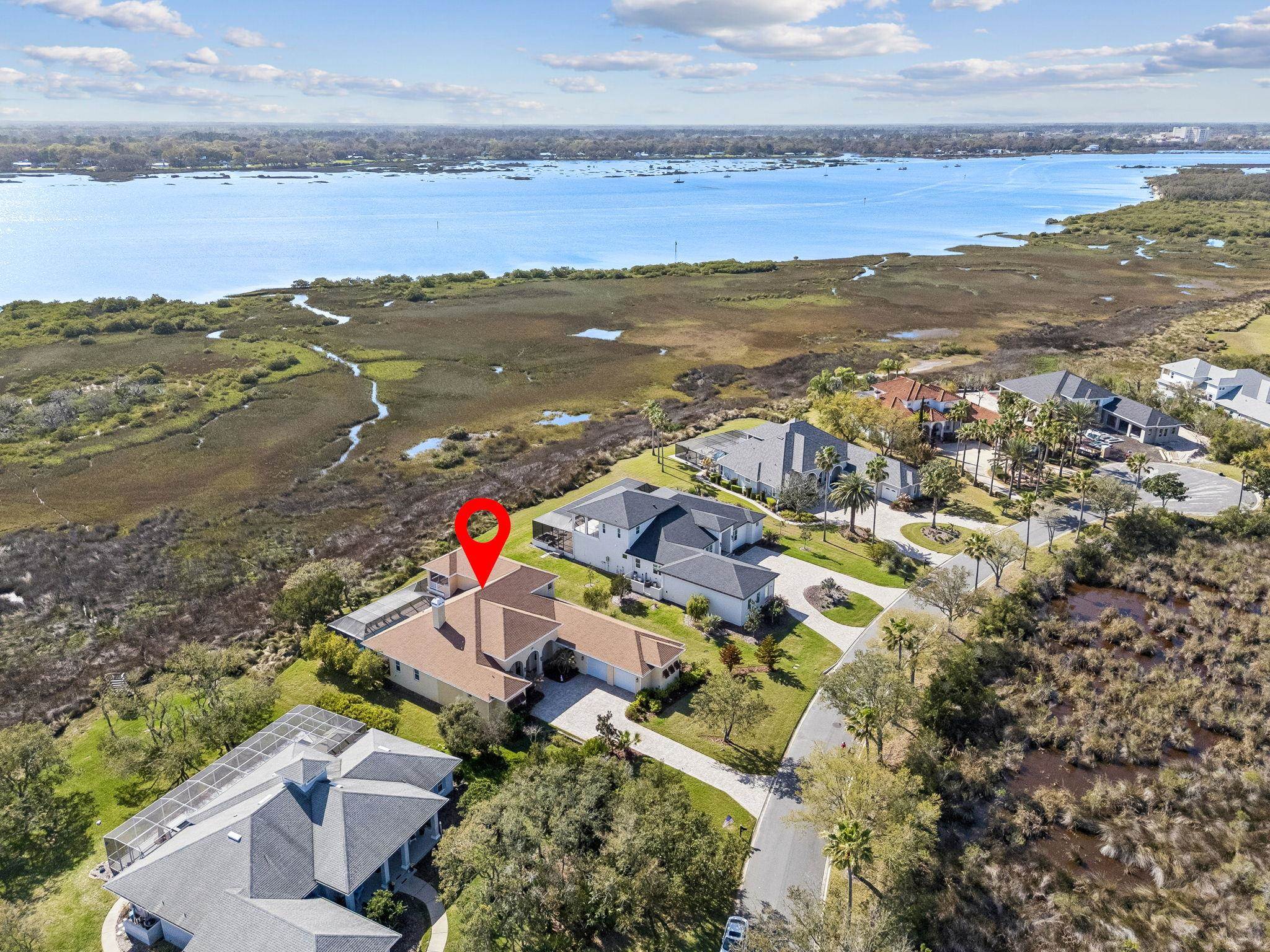 409 Lookout Point Drive St. Augustine, FL 32080 - Photo 5 of 90 Aerial view of residential area with a large body of water