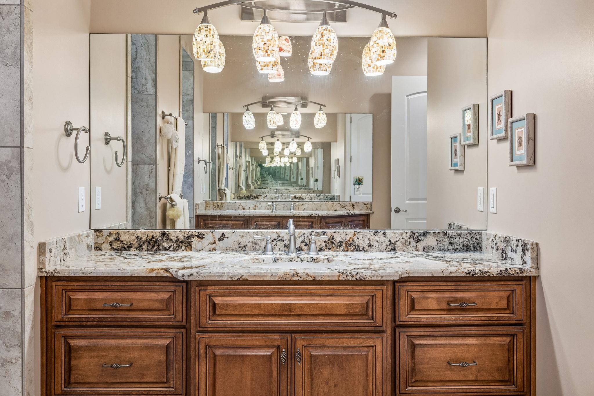409 Lookout Point Drive St. Augustine, FL 32080 - Photo 53 of 90 Bathroom with suspended lighting and vanity