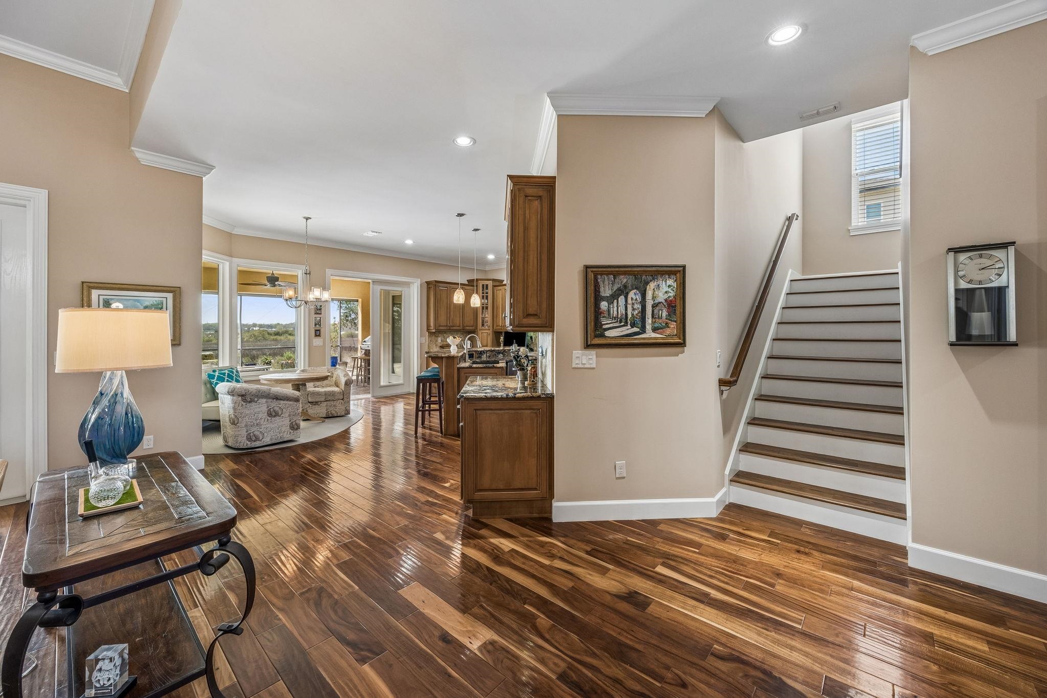 409 Lookout Point Drive St. Augustine, FL 32080 - Photo 56 of 90 a living room with furniture and wooden floor