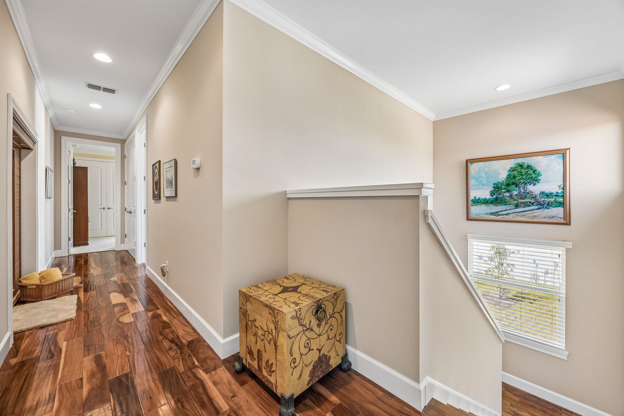 409 Lookout Point Drive St. Augustine, FL 32080 - Photo 57 of 90 a living room with furniture and a wooden floor