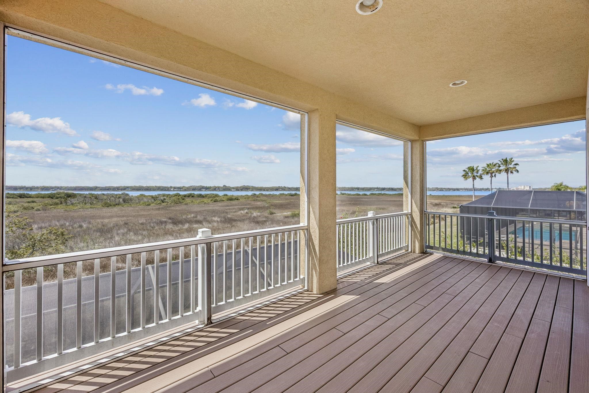 409 Lookout Point Drive St. Augustine, FL 32080 - Photo 67 of 90 a view of a balcony with wooden floor
