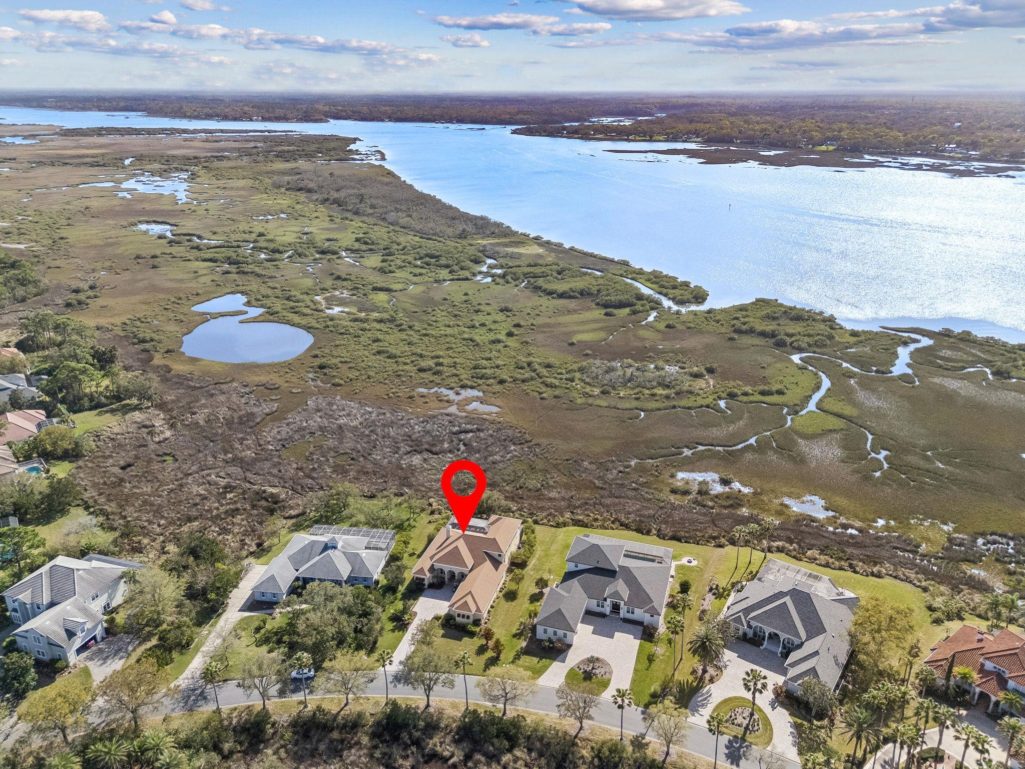 409 Lookout Point Drive St. Augustine, FL 32080 - Photo 7 of 90 Aerial view of residential area with a nearby body of water