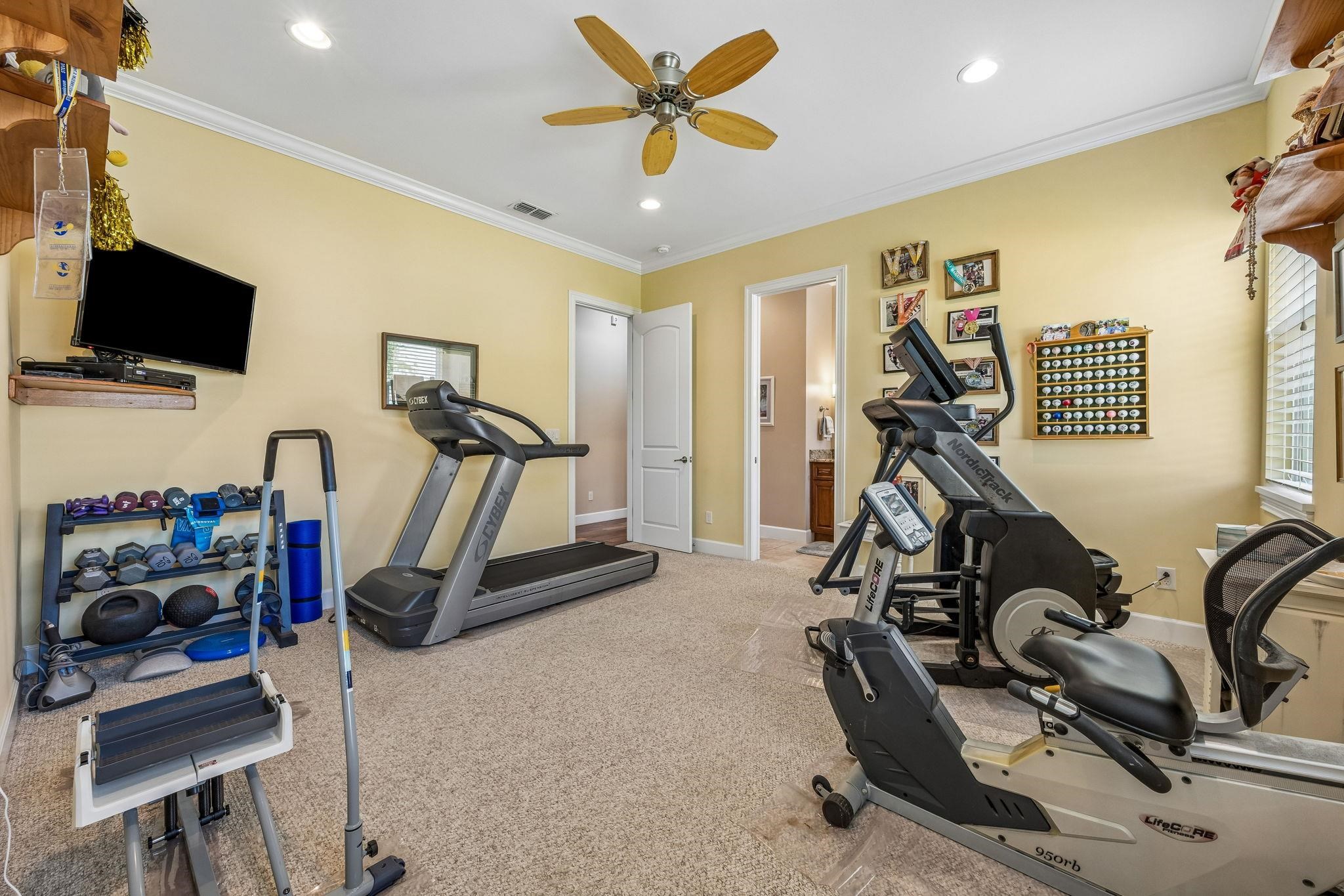 409 Lookout Point Drive St. Augustine, FL 32080 - Photo 72 of 90 Workout room with crown molding, recessed lighting, and ceiling fan