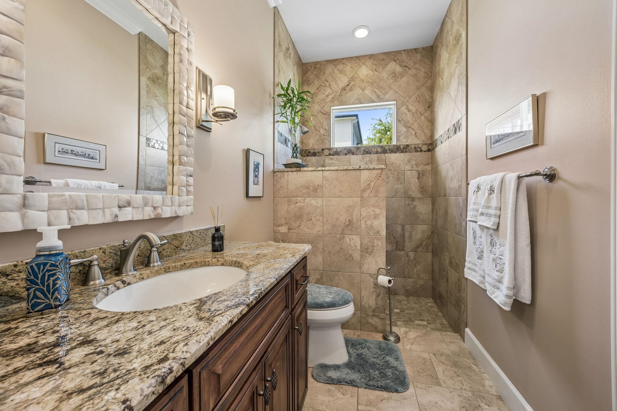409 Lookout Point Drive St. Augustine, FL 32080 - Photo 74 of 90 Bathroom featuring vanity and walk in shower
