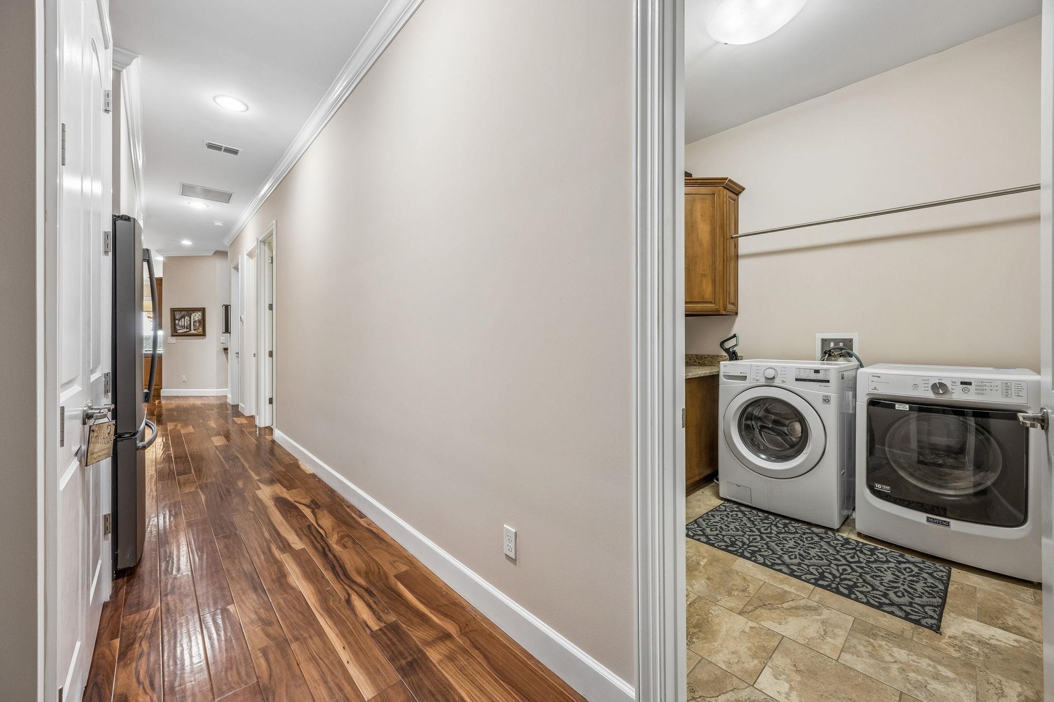 409 Lookout Point Drive St. Augustine, FL 32080 - Photo 75 of 90 a view of a storage and utility room with washer and dryer