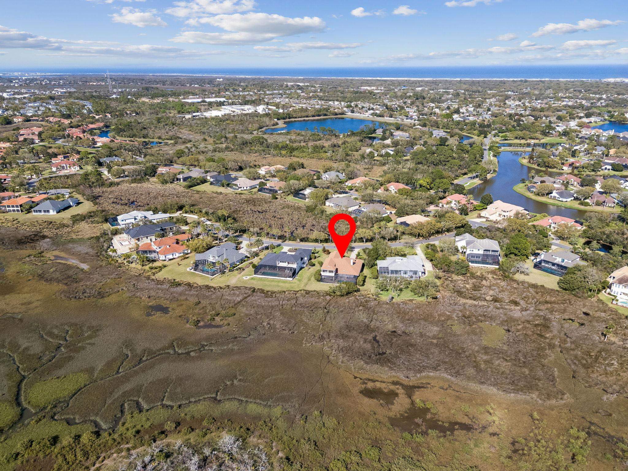 409 Lookout Point Drive St. Augustine, FL 32080 - Photo 78 of 90 Aerial overview of property's location with nearby suburban area and a large body of water