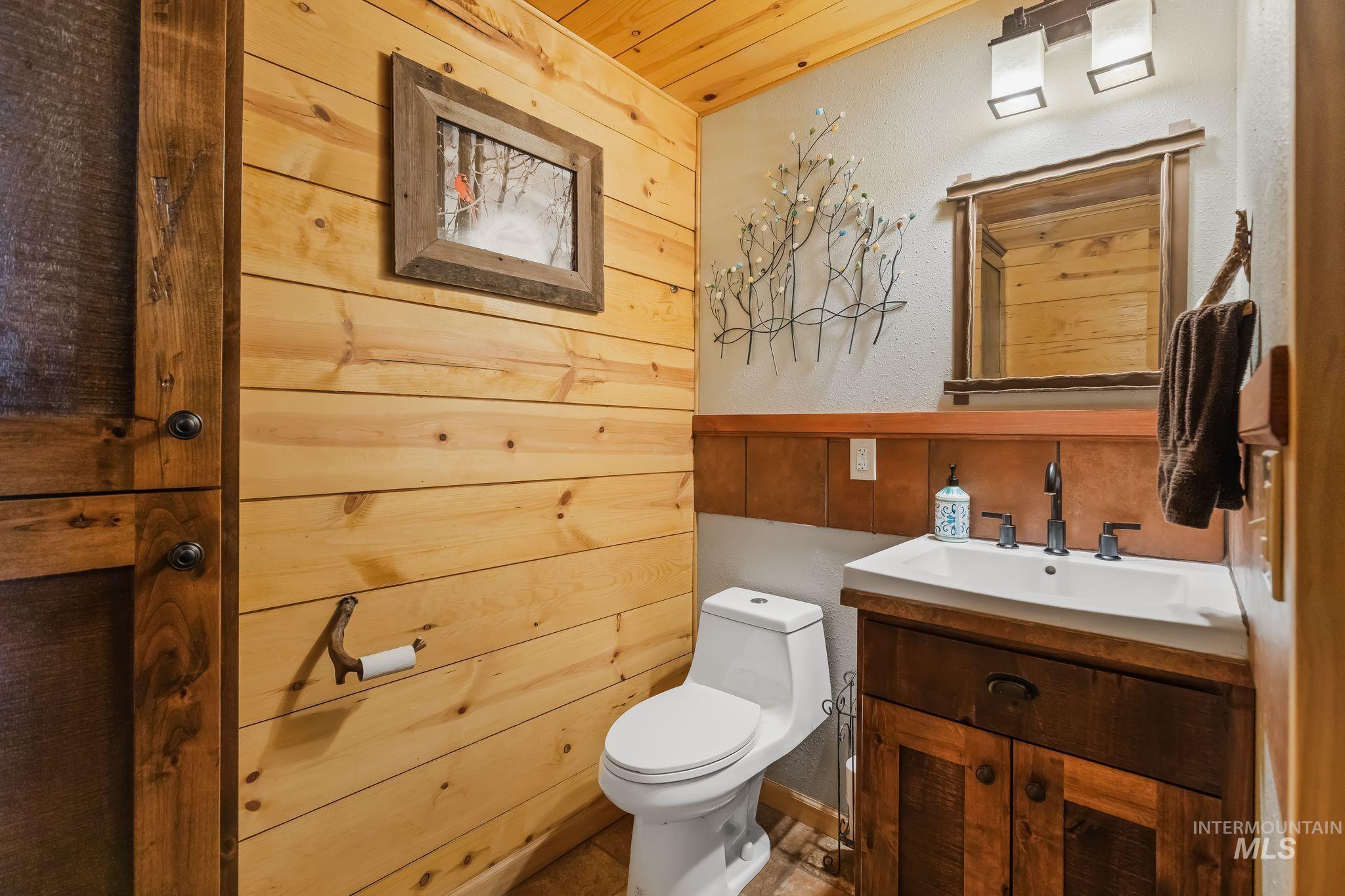 3989 East Mountain Road Anatone, WA 99401 - Photo 14 of 49 Pine wood paneling and wood-finish flooring