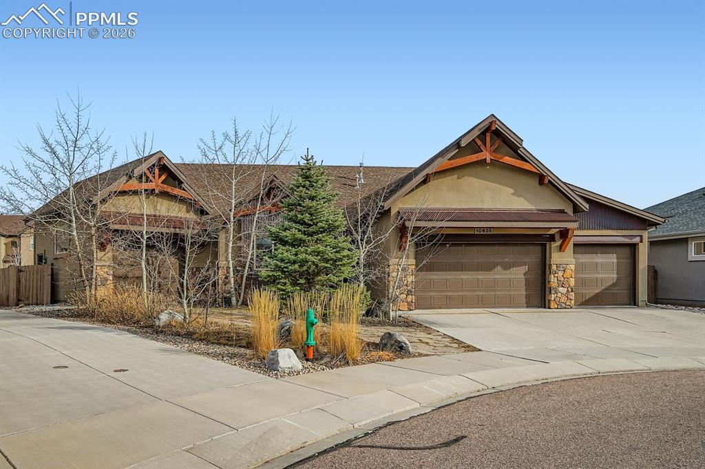 10625 Slumber Ridge Way Colorado Springs, CO 80908 - Photo 2 of 36 luxury tucked into a quiet cul-de-sac