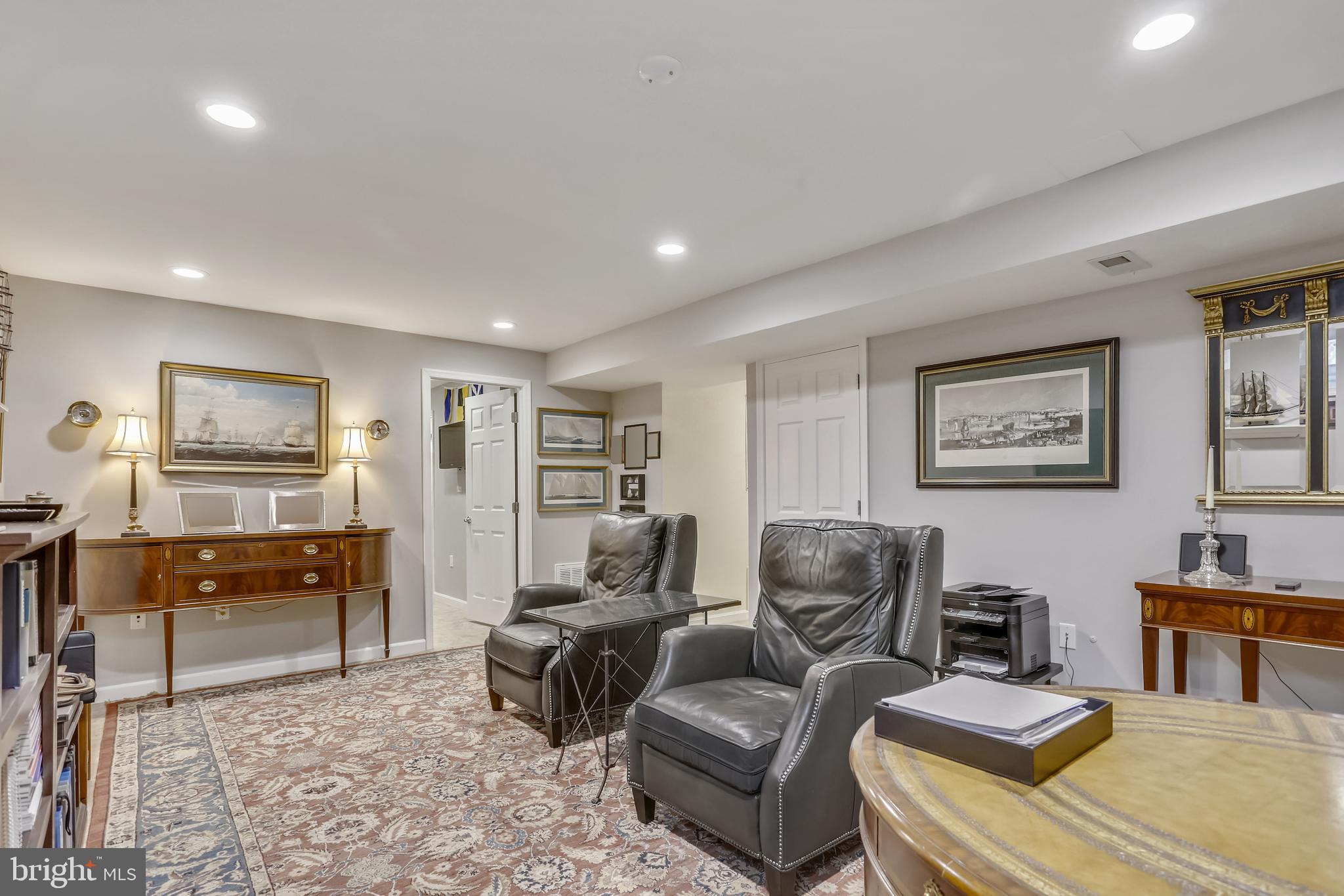 10783 Kinloch Road Silver Spring, MD 20903 - Photo 28 of 43 a living room with furniture and a wooden floor